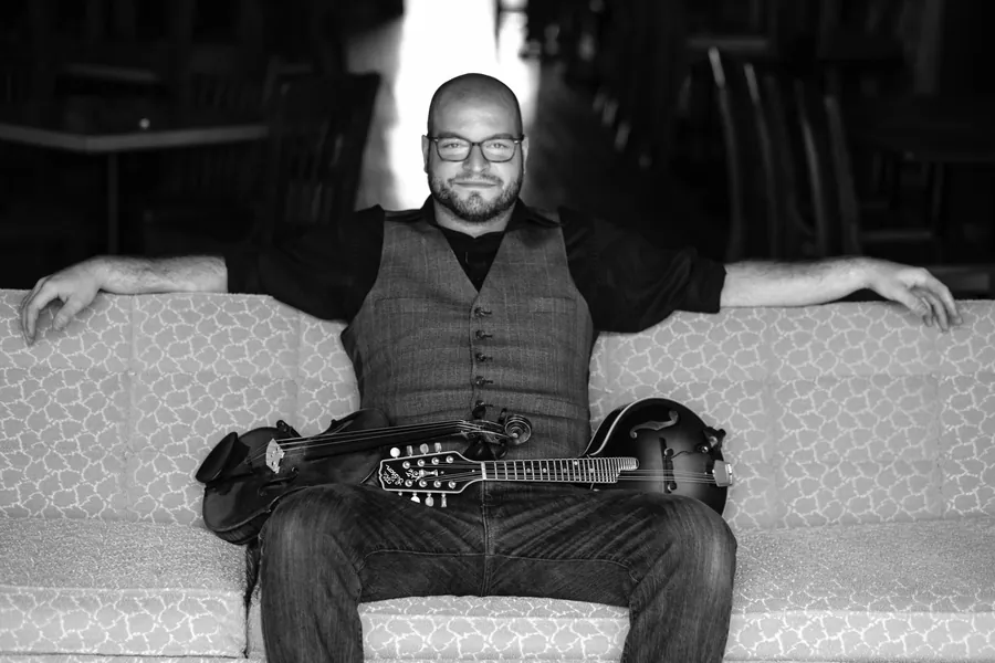 Wes Fritzemeier with fiddle and mandolin